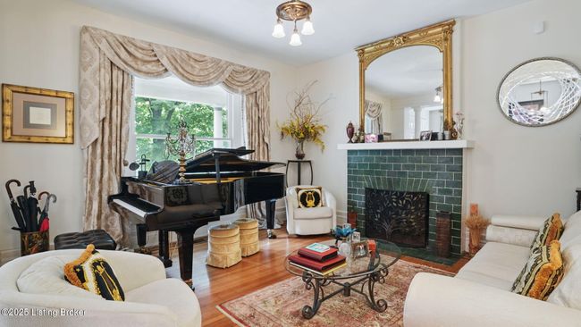 Formal living room w/fireplace. | Image 10