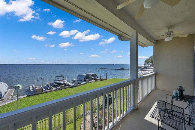 This private balcony off the primary suite offers spectacular sunrise views perfect for enjoying an early morning cup of coffee. | Image 16