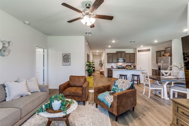 View 1 featuring light laminated wood-plank flooring, ceiling fan, and recessed lighting. | Image 4