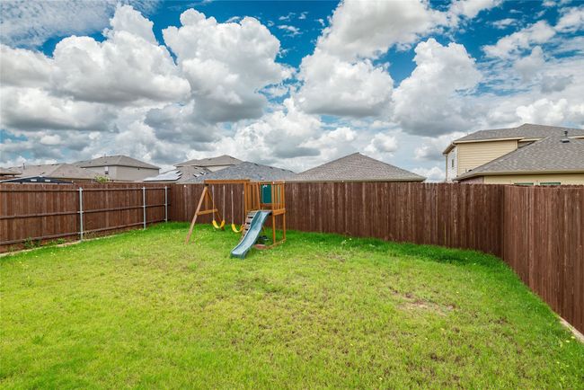 View of yard with a​​‌​​​​‌​​‌‌​‌‌​​​‌‌​​‌‌​‌​​​​​‌ playground | Image 34