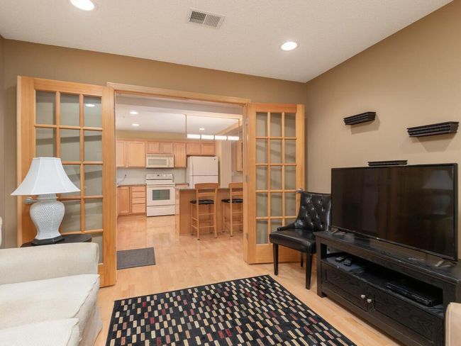 French doors open to foyer / kitchen. | Image 16