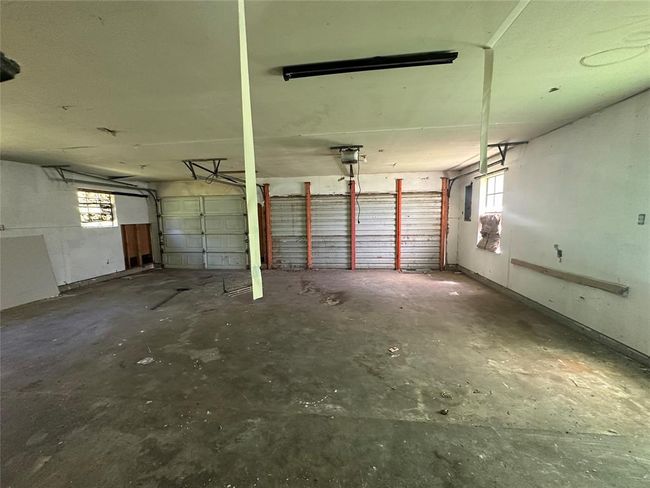 Large extra long two car garage. | Image 22