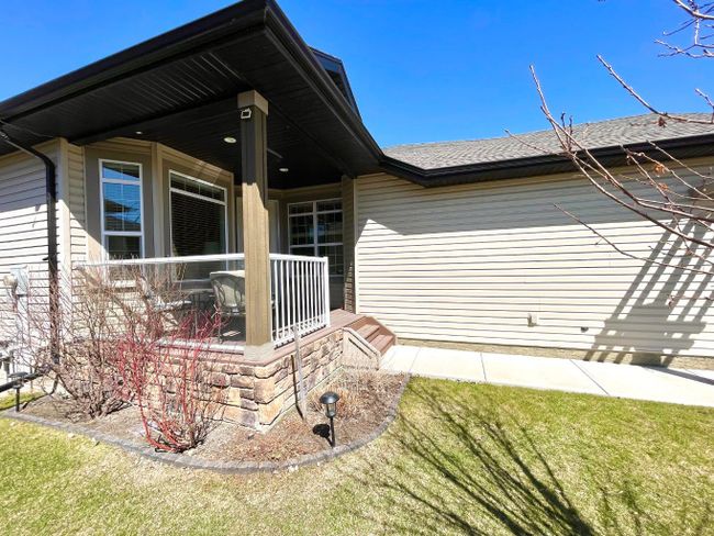 1909 Riverside Drive Nw, Home with 2 bedrooms, 2 bathrooms and 4 parking in High River AB | Image 2