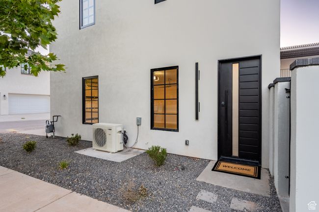 Doorway to property with ac unit | Image 43