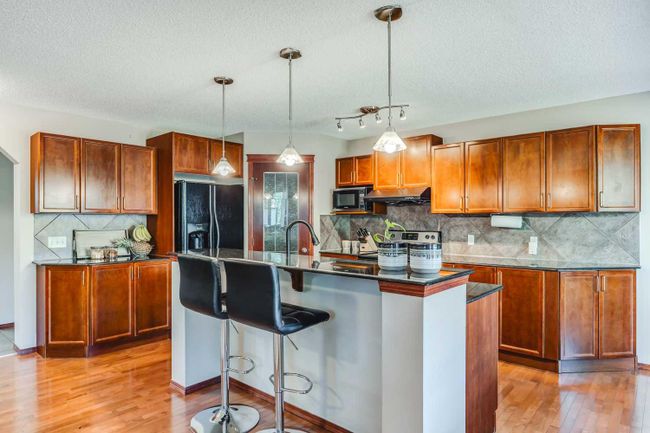 10 Kincora Heights Nw, Home with 4 bedrooms, 3 bathrooms and 4 parking in Calgary AB | Image 9