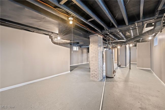 Basement featuring gas water heater | Image 27