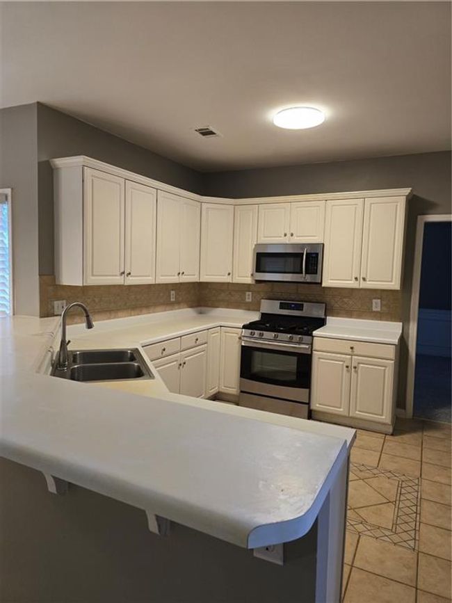 1434 Oglethorpe Dr, House other with 4 bedrooms, 3 bathrooms and null parking in Suwanee GA | Image 12