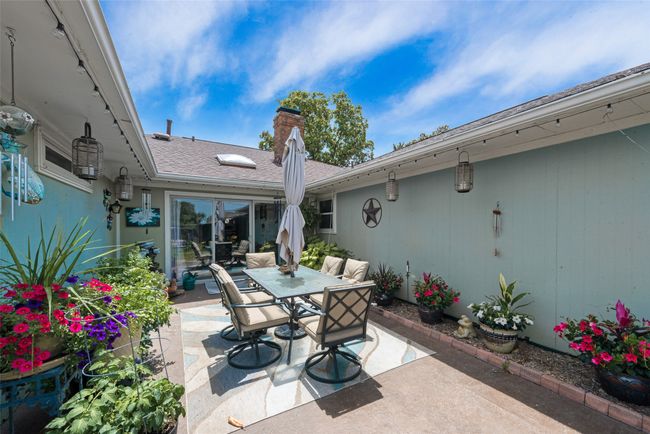 View of patio featuring outdoor dining area | Image 29