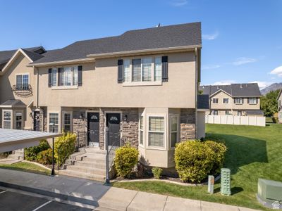 View of front of property featuring a front yard | Image 1