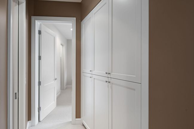 Bedroom level hallway with closets | Image 39