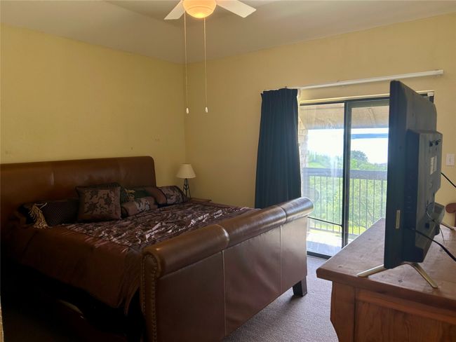 Carpeted bedroom with access to exterior and a ceiling fan | Image 13