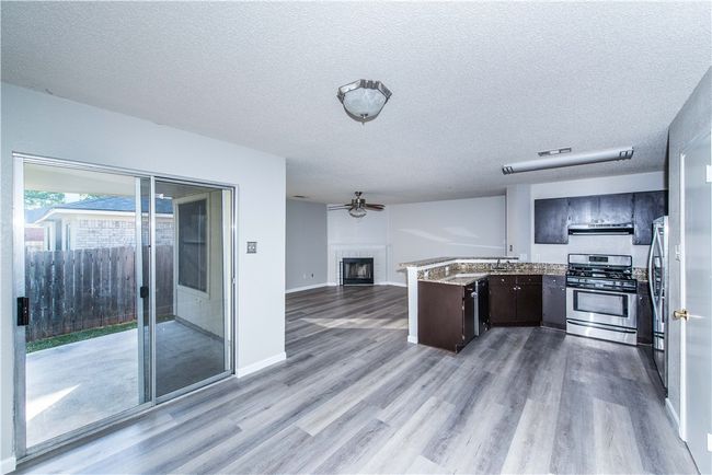 looking back from dining area to kitchen | Image 6