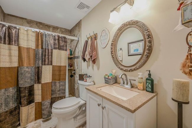 Bathroom Featuring Toilet, Vanity & Shower Stall | Image 30