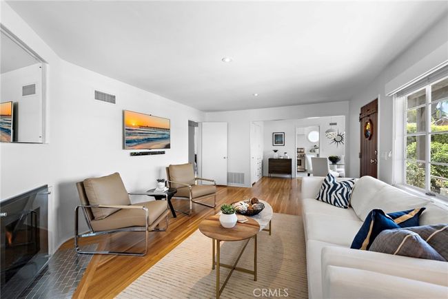 Living Room with door to Kitchen. | Image 7