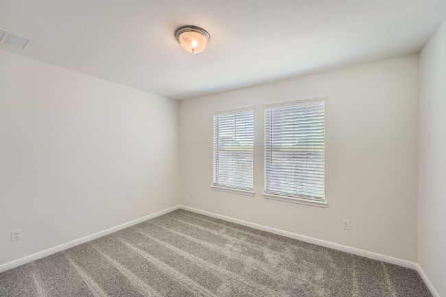 Unfurnished room with visible vents, baseboards, and carpet floors | Image 20