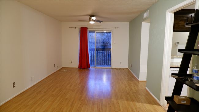 Living/dining combo room with ceiling fan and light hardwood / wood-style flooring | Image 5