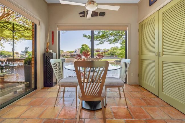 Eating area in Kitchen with view of lake. | Image 23