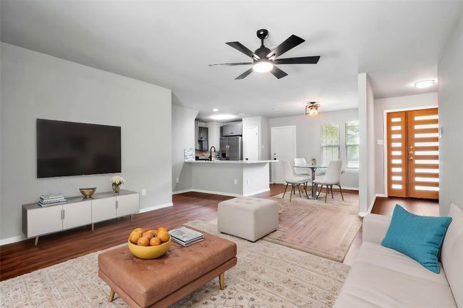 Virtually Staged Living alternative showing kitchen with view of entry | Image 6