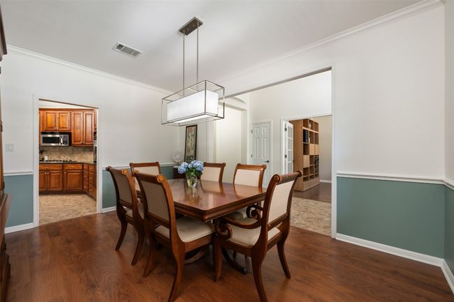 The formal dining room is located to the left of the front entryway. | Image 5