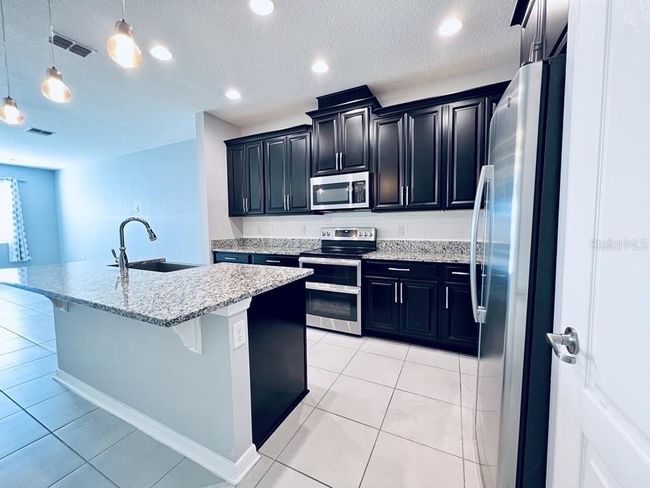 2917 Econ Landing Blvd, Townhouse with 3 bedrooms, 3 bathrooms and null parking in Orlando FL | Image 5