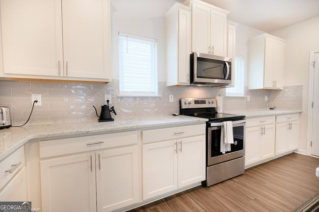2798 Morgan Spring Trl, House other with 5 bedrooms, 3 bathrooms and null parking in Buford GA | Image 9