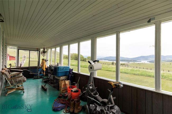 Sunroom / solarium with a mountain view and a rural view | Image 27