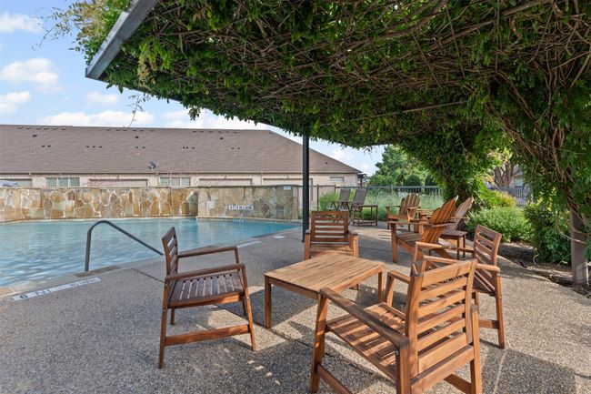 Sit by the pool and enjoy a game of cards. | Image 30