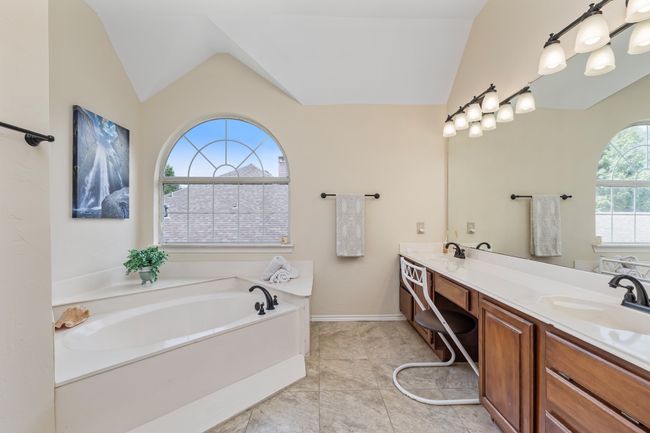 Bathroom featuring vanity and a shower stall | Image 27
