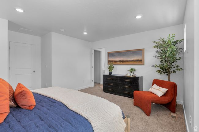 Bedroom with light colored carpet and recessed lighting | Image 15