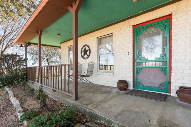 Covered front wrap around porch | Image 9