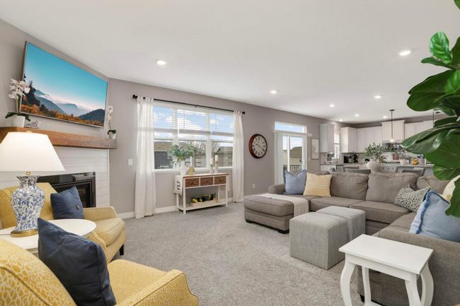Lots of natural light pours in through the windows and slider | Image 4