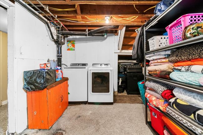 Laundry room with washing machine and dryer and laundry area | Image 43