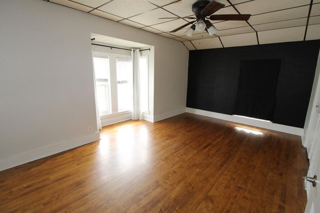 Main Upper 13x17 Bedroom with Bay Window | Image 18