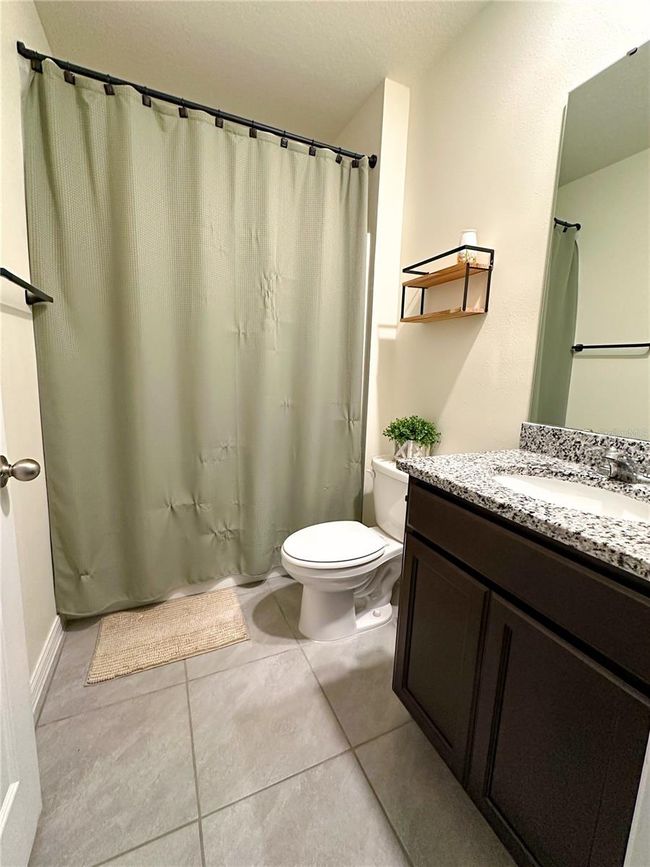 Downstairs full bath | Image 14
