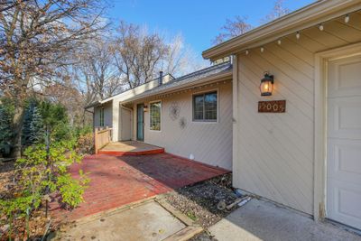 Awesome front deck is ideal for entertaining friends/family. Faces West for some spectacular sunsets! | Image 2