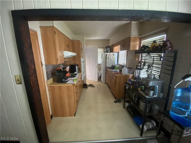 This is the kitchen taken from the front living room | Image 13