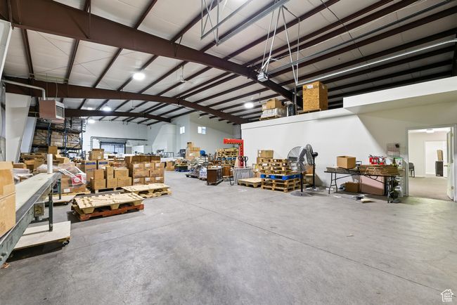 Garage featuring a workshop area | Image 5