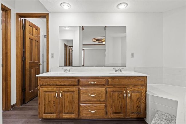 Bathroom with vanity and wood-type flooring | Image 28