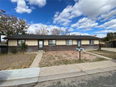 5803 Oneida Street, Home with 6 bedrooms, 3 bathrooms and 4 parking in Commerce City CO | Image 1