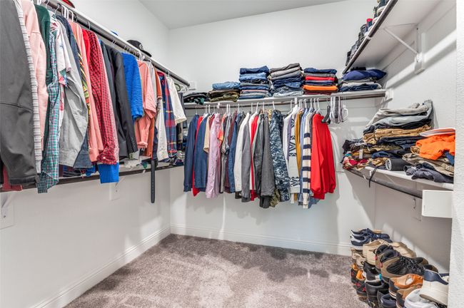 Spacious closet featuring carpet | Image 28