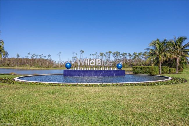View of community featuring a water view and a yard | Image 44