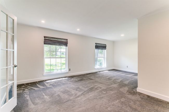 Carpeted spare room with recessed lighting and crown molding | Image 7