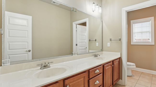 Full bathroom with double vanities off the 2nd floor landing. | Image 30