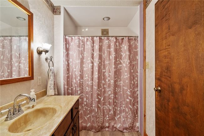 Full bath located on Main Living level | Image 17