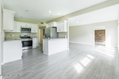 Kitchen with large dining area | Image 3