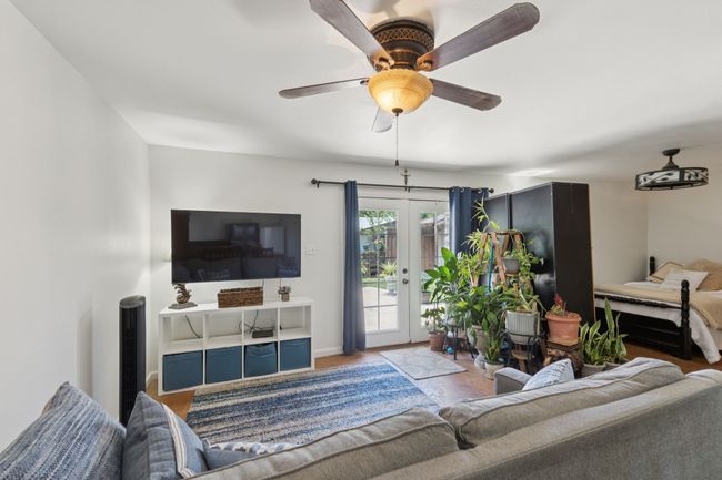 Mother In Law Suite Living area featuring ceiling fan and french doors | Image 17