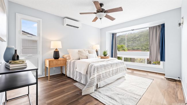 Professionally staged; primary bedroom | Image 14