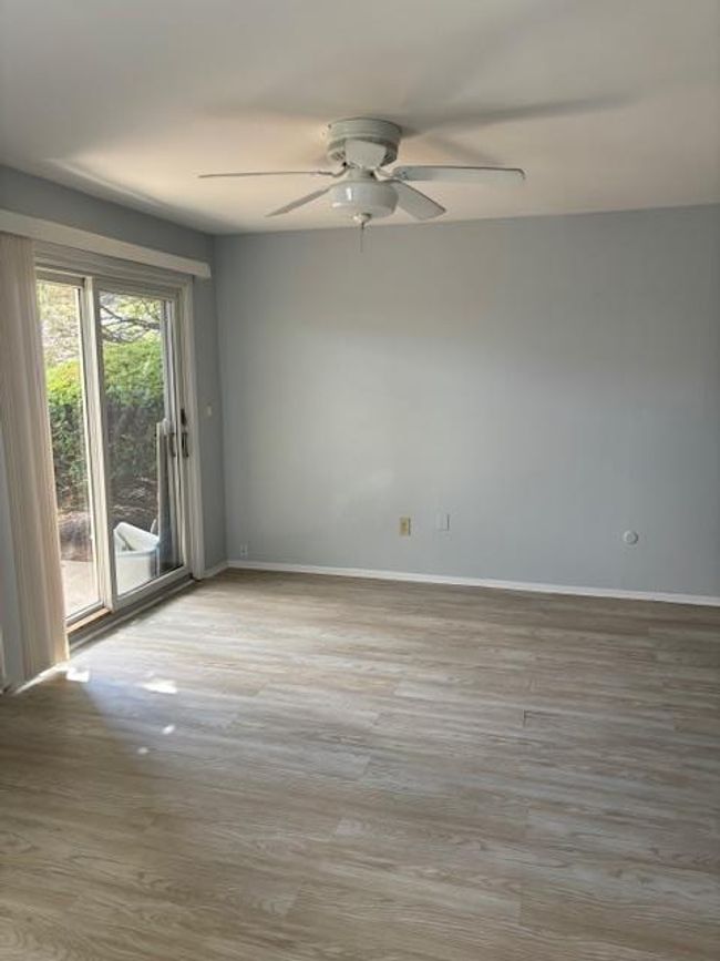 Dining room view looking into the living room | Image 6