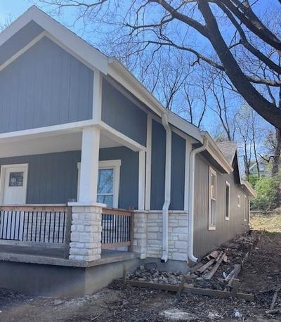 View of home's exterior featuring a porch | Image 3