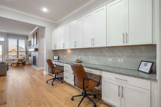For the remote worker or student, double deck tech center is conveniently located next to the kitchen where you'll find the coffee and snacks. | Image 17